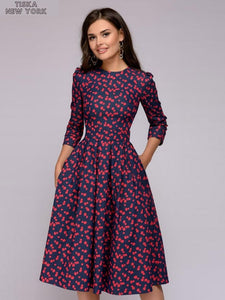 woman wearing navy blue knee length vintage dress